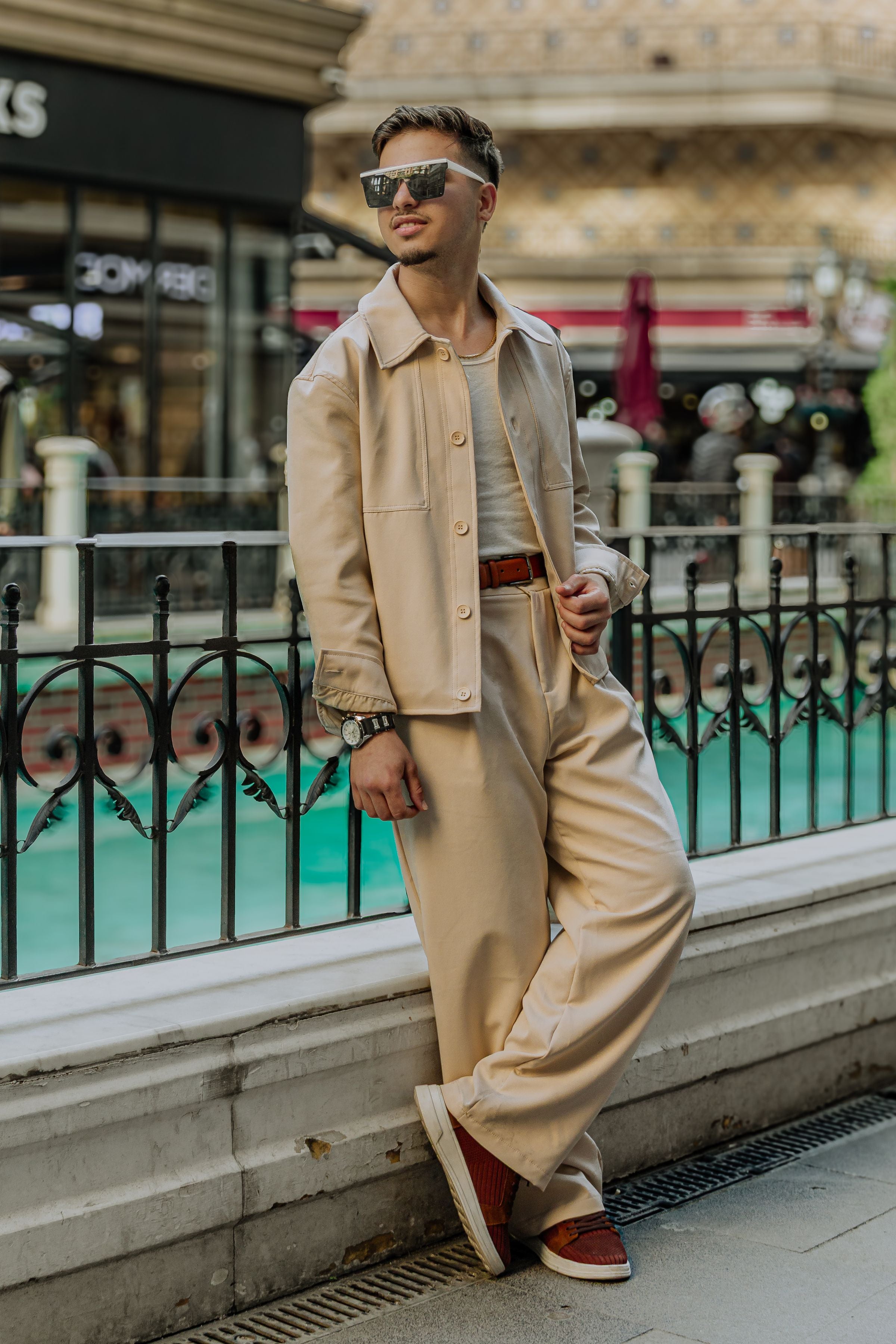 Darkhill — Beige overshirt + wide trousers on canal promenade, easy confident pose