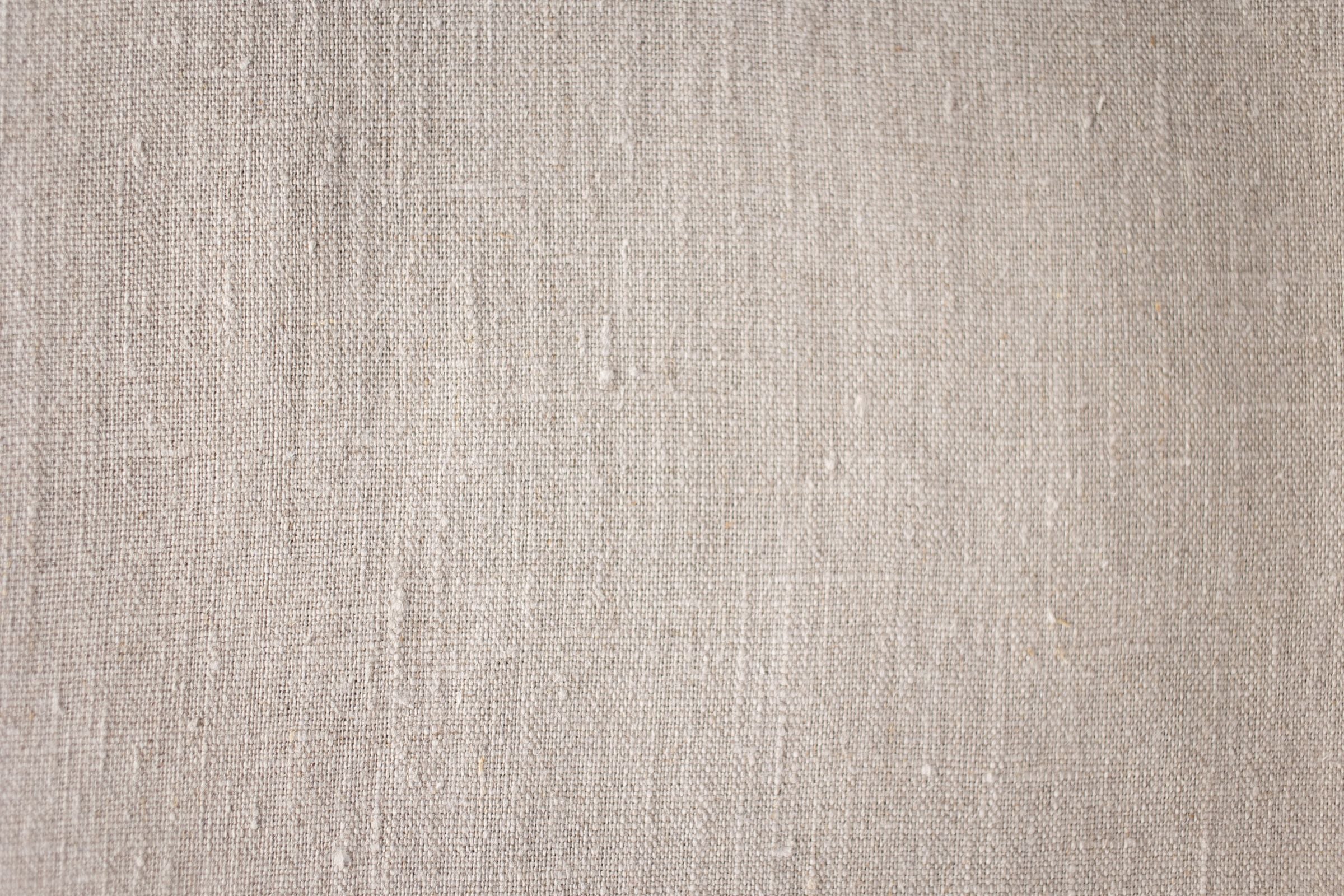 Darkhill — Macro of natural beige linen weave — fabric story block