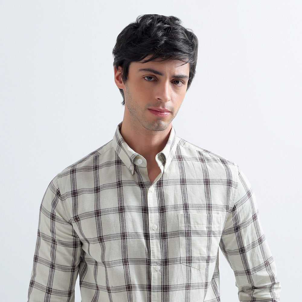 Man in an ecru plaid Darkhill shirt